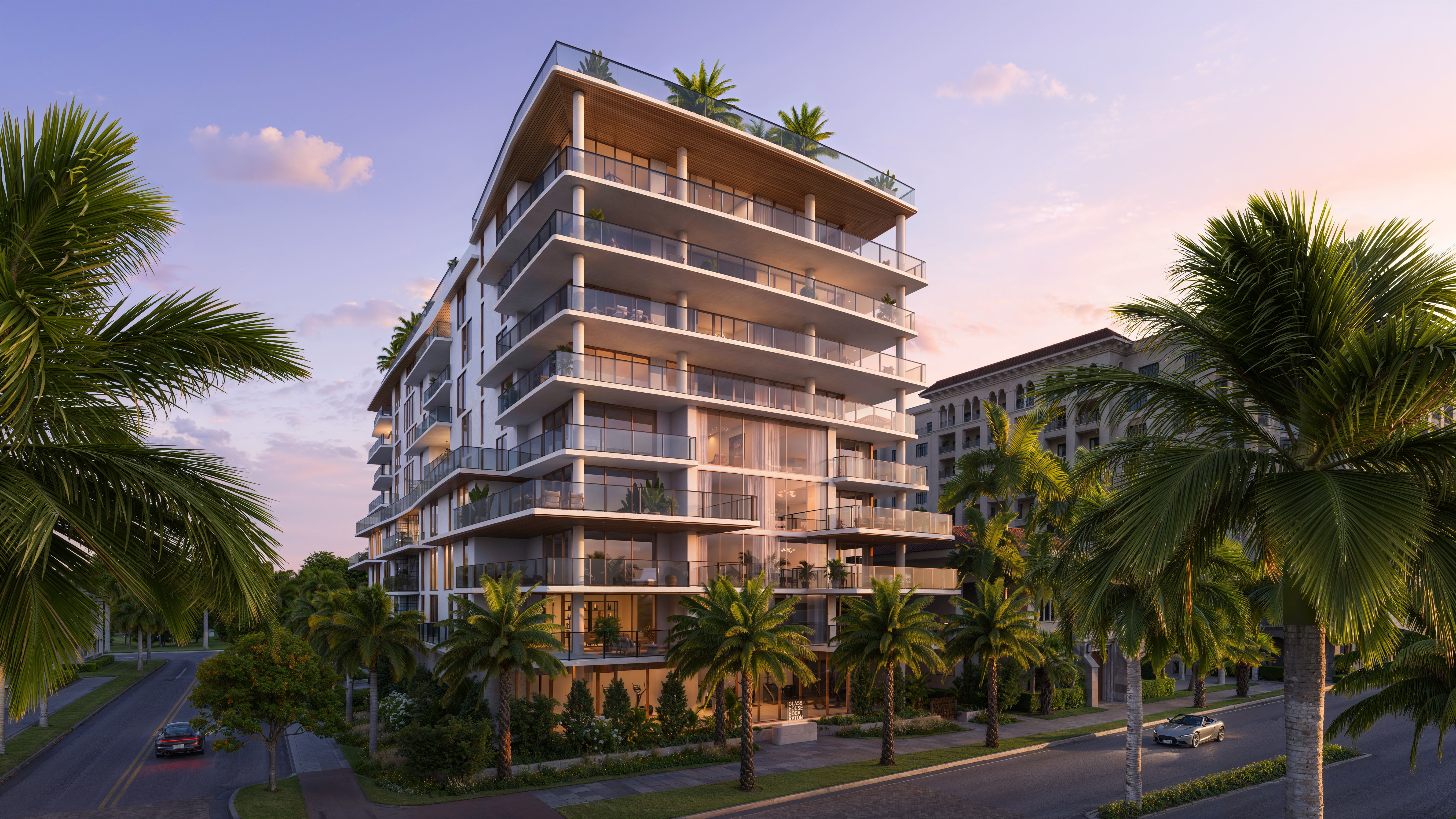 The modern glass architecture of Glass House Boca Raton rising nine stories in the city center